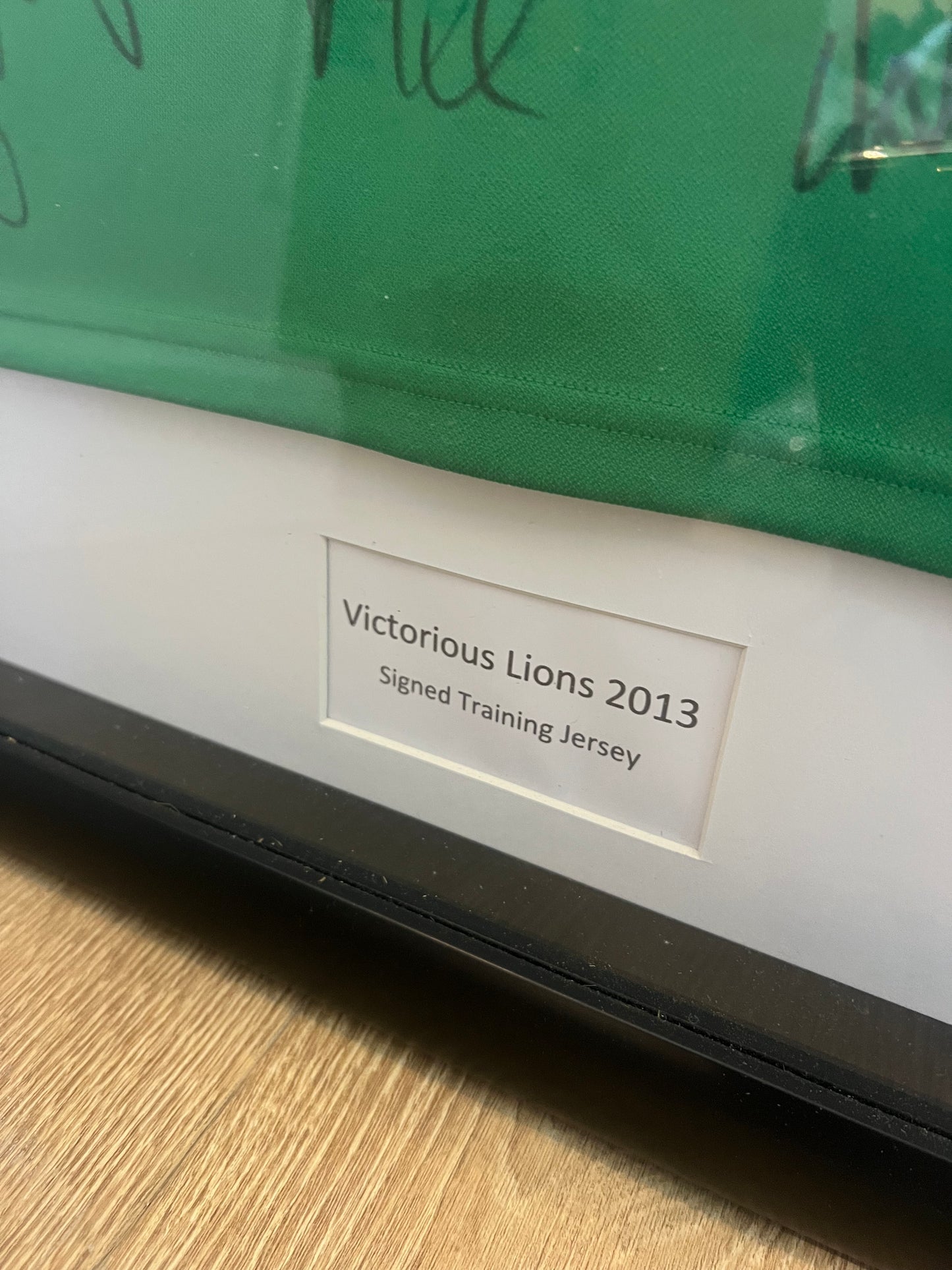 Signed + Framed Victorious Lions 2013 Training Shirt