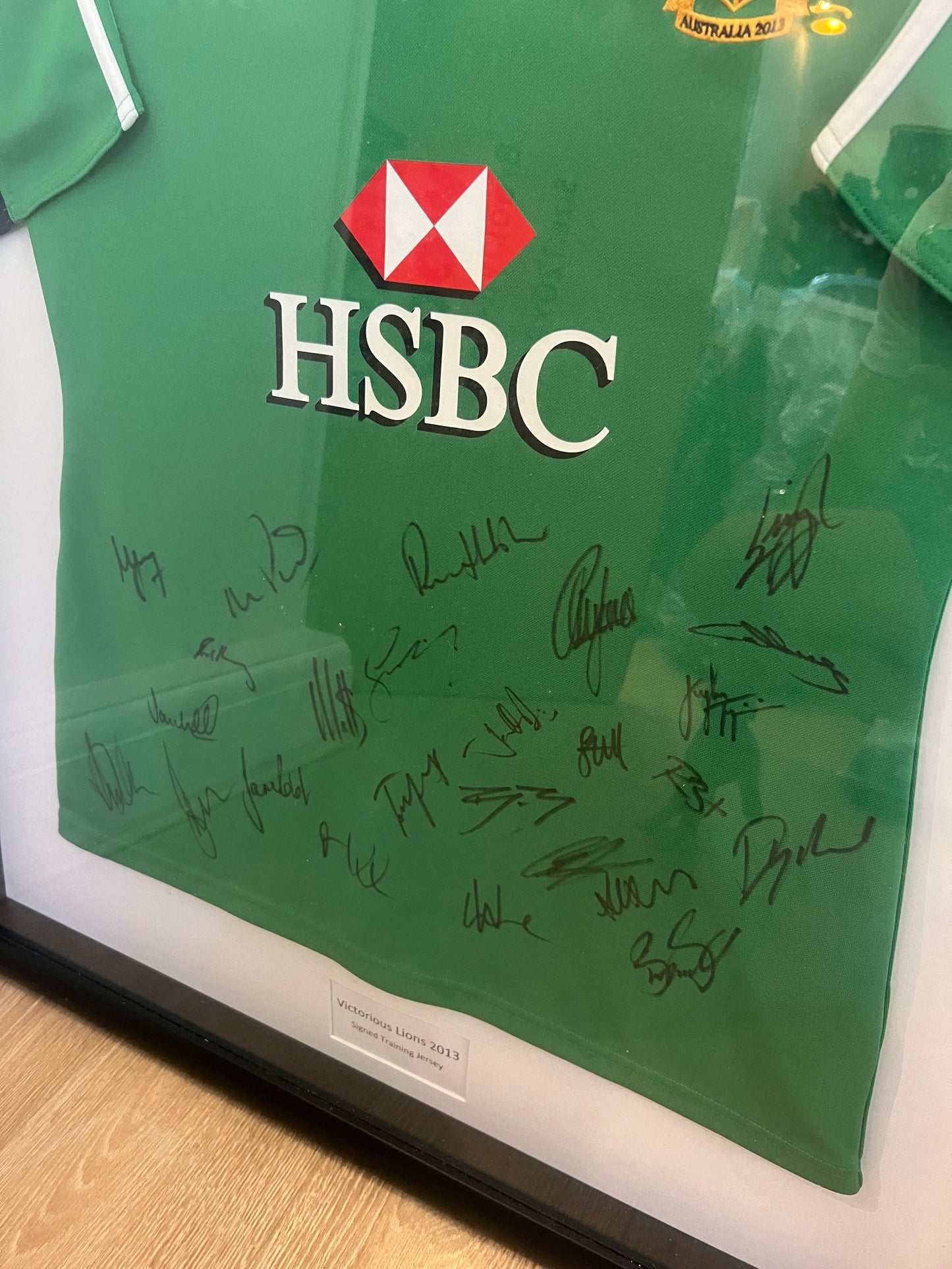 Signed + Framed Victorious Lions 2013 Training Shirt